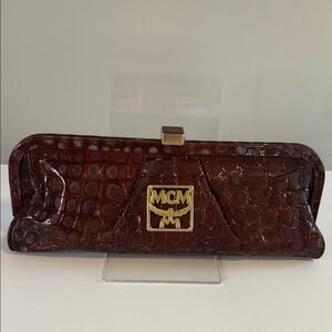 MCM Burgundy Crocodile Embossed Clutch with Gold Accent